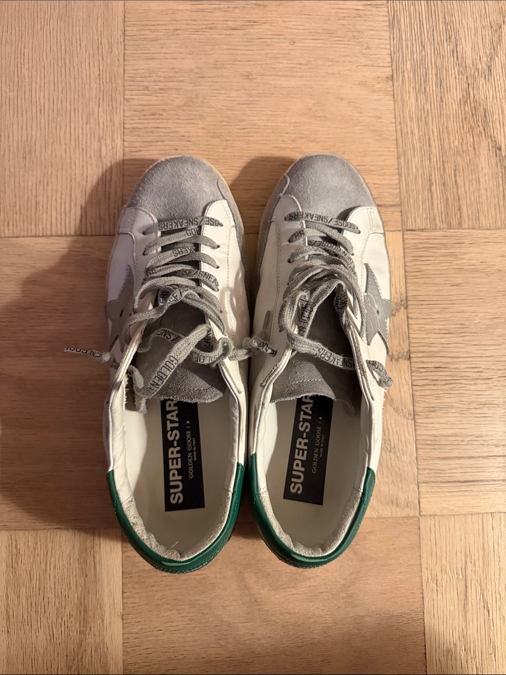 Golden Goose Men’s White and Gray Sneakers with Green Heel Tab